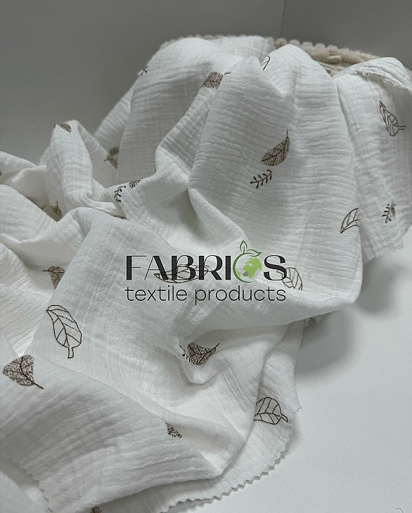 M 4007 C2 Муслін жатка 2-х шаровий принт рослинний листочки ,пір'ячка ,коричневі на молочному 100% б