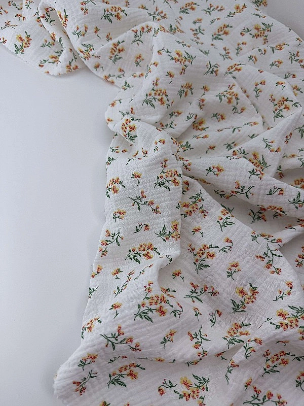 MINT-6 Муслін жатка 2-х шаровий принт квіти помаранчеві на молочному 100% бавовна 135-140 см 125-135