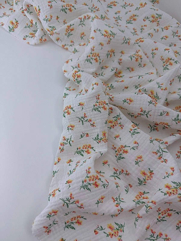 MINT-6 Муслін жатка 2-х шаровий принт квіти помаранчеві на молочному 100% бавовна 135-140 см 125-135