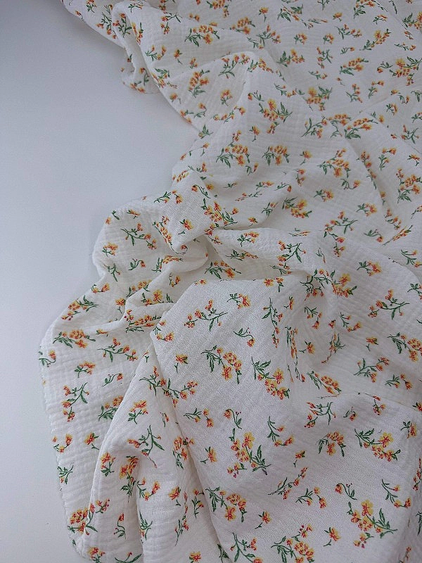 MINT-6 Муслін жатка 2-х шаровий принт квіти помаранчеві на молочному 100% бавовна 135-140 см 125-135