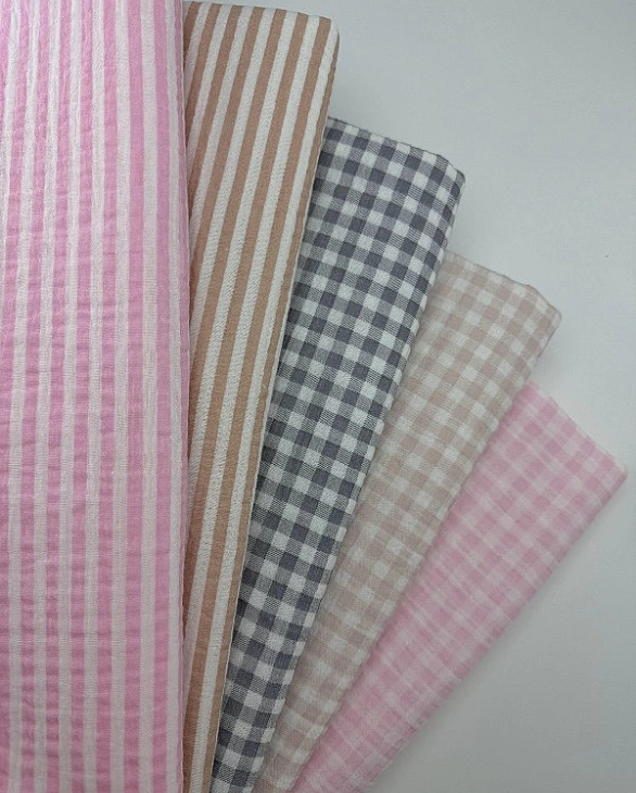 M 6013 C50 Муслін 2-х шаровий принт геометричний клітинка на біло-сірому 100% бавовна 160 см 125-135