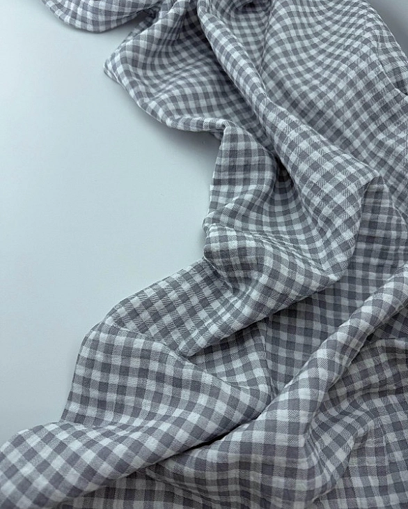 M 6013 C50 Муслін 2-х шаровий принт геометричний клітинка на біло-сірому 100% бавовна 160 см 125-135