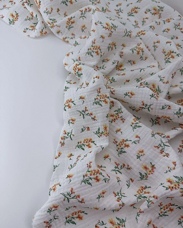 MINT-6 Муслін жатка 2-х шаровий принт квіти помаранчеві на молочному 100% бавовна 135-140 см 125-135