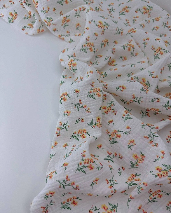 MINT-6 Муслін жатка 2-х шаровий принт квіти помаранчеві на молочному 100% бавовна 135-140 см 125-135