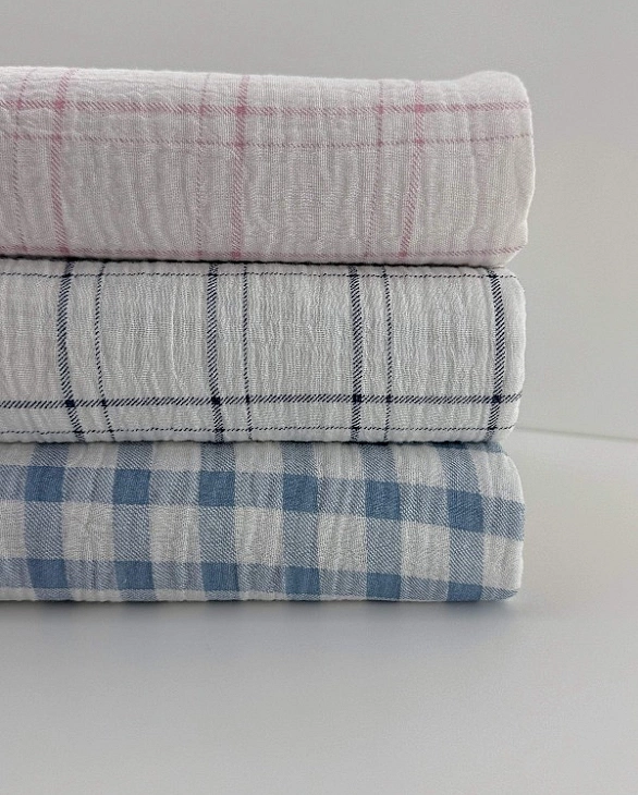 MINT-9 Муслін жатка 2-х шаровий принт геометричний клітинка синя середня на молочному 100% бавовна 1