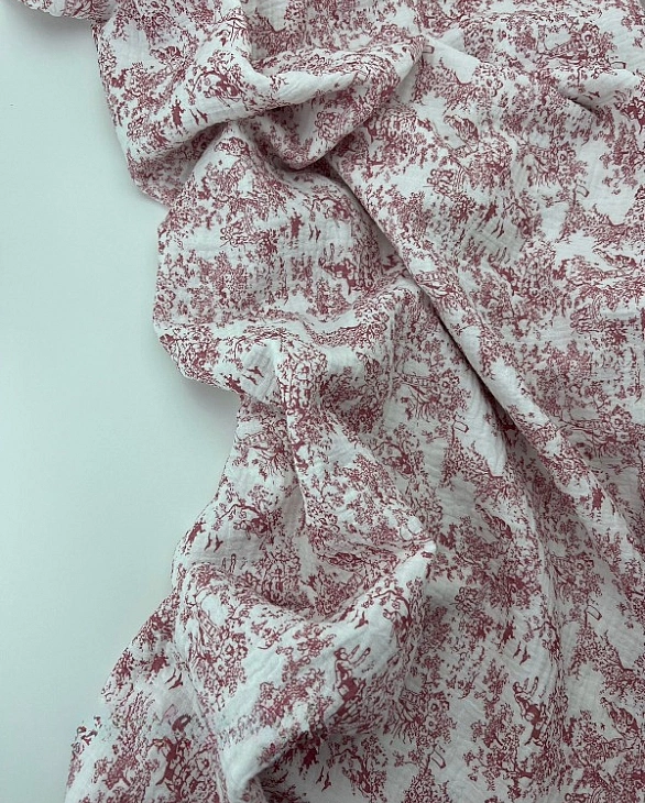 M 106 C2 Муслін жатка 2-х шаровий принт Діор рожевий на молочному 100% бавовна 135-140 см 125-135 гр