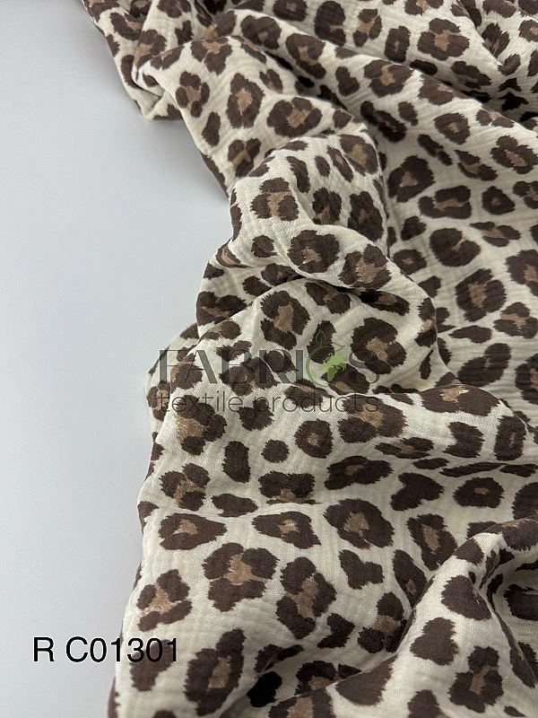 M 115 C 3 Муслін жатка 2-х шаровий принт цятки леопард коричневі на айворі 100% бав
