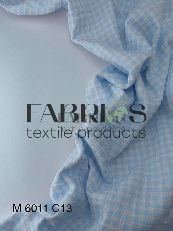 M 6011 C13 Муслін жатка 2-х шаровий принт геометричний клітинка блакитна на молочному