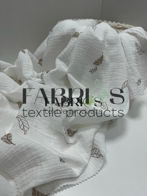 M 4007 C2 Муслін жатка 2-х шаровий принт рослинний листочки ,пір'ячка ,коричневі на молочному 100% б